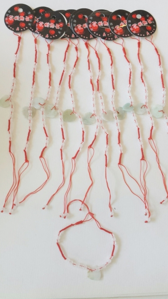 Armbandjes set a 12 Lucky Bracelets Hart groen-rood