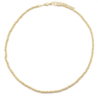 Ketting kort met kleine glaskraaltjes goud